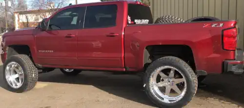 Our shop built this Chevy Silverado 4x4 Lifted Truck